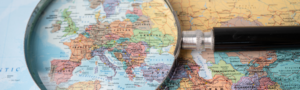 Magnifying Glass Over Europe on Map
